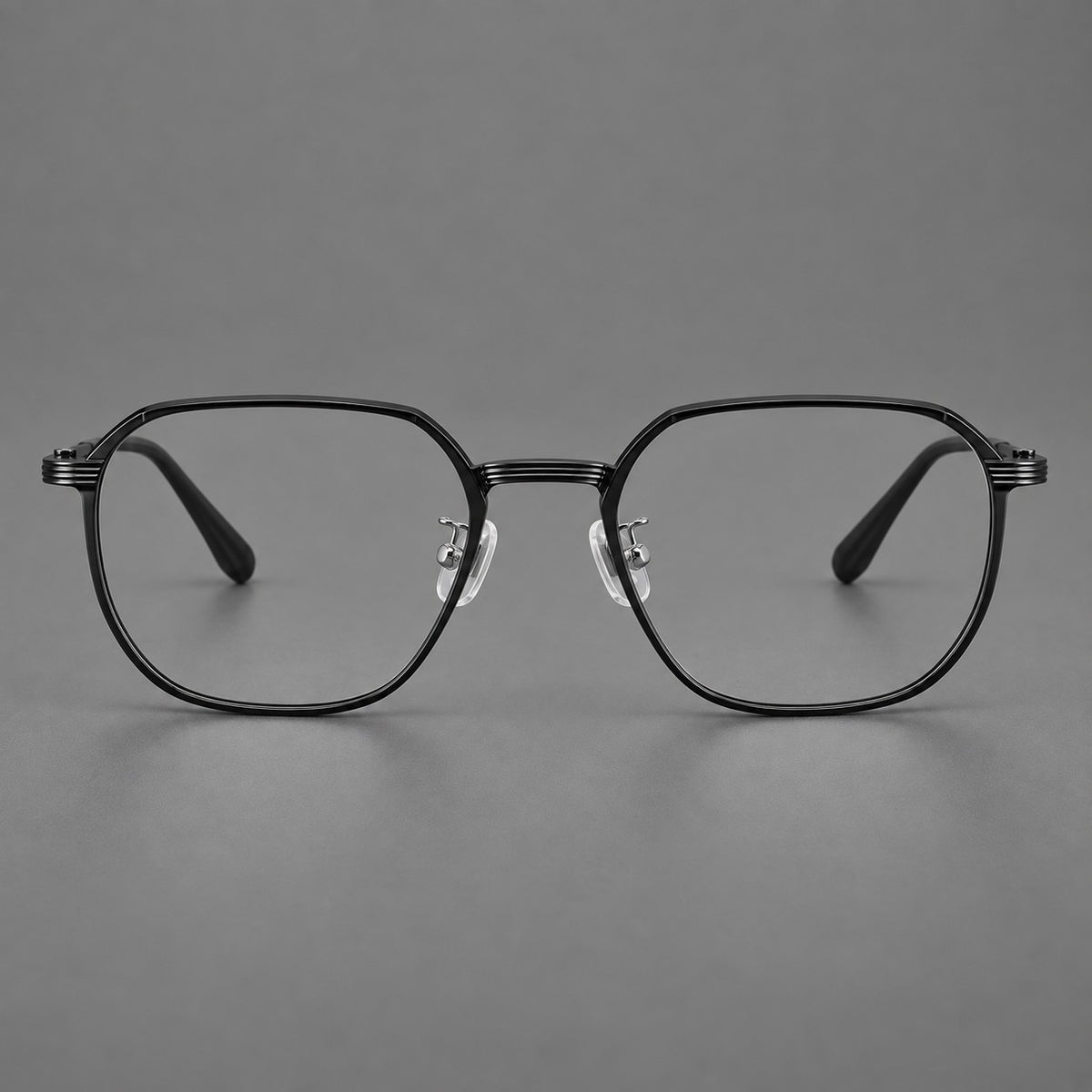 Geometric titanium glasses with flattened corners and a finely ridged bridge in Black, front view
