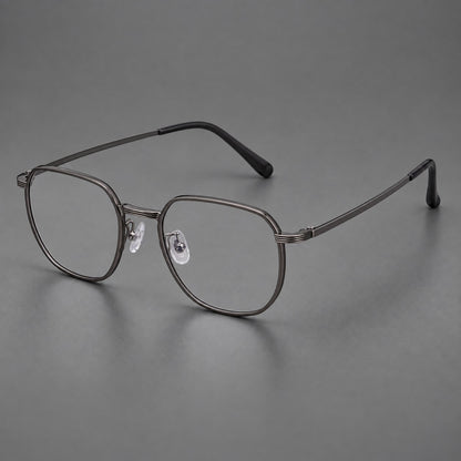Geometric titanium glasses with flattened corners and a finely ridged bridge in Dark Grey, three quarter view front view