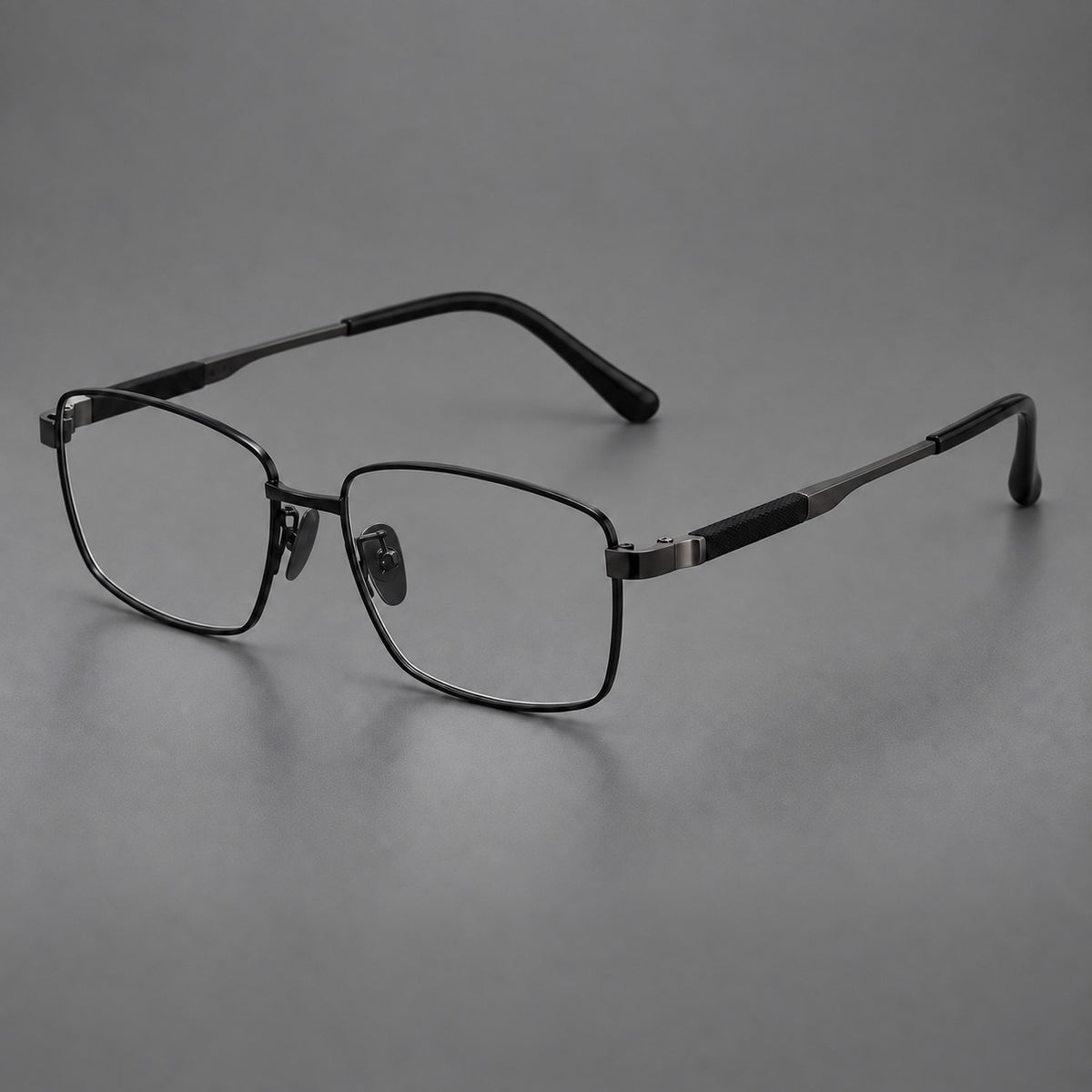 Slim rectangular titanium glasses with broad temples and contrasting dark inserts in Black, three quarter view