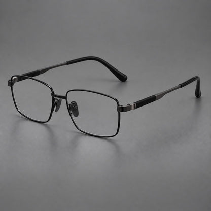 Slim rectangular titanium glasses with broad temples and contrasting dark inserts in Black, three quarter view