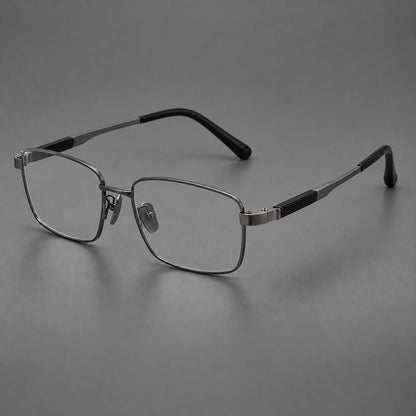 Slim rectangular titanium glasses with broad temples and contrasting dark inserts in Gunmetal, three quarter view front view
