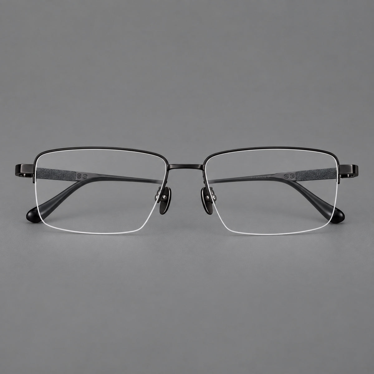 Wide half frame titanium glasses with rectangular lenses and textured temples in Black, front view