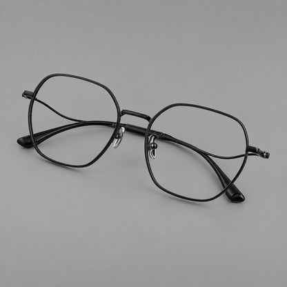 Geometric titanium glasses with engraved rim edges and curved temple joins in Black, three quarter view