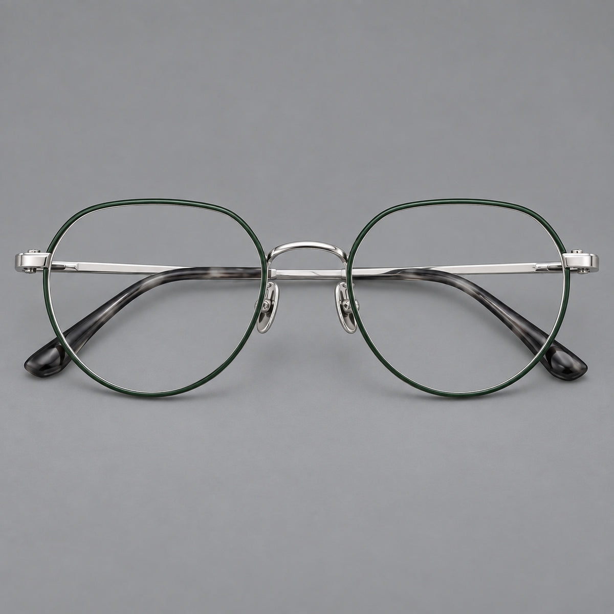 Classic panto titanium glasses with a curved bridge and slim straight temples in Dark Green and Silver, front view