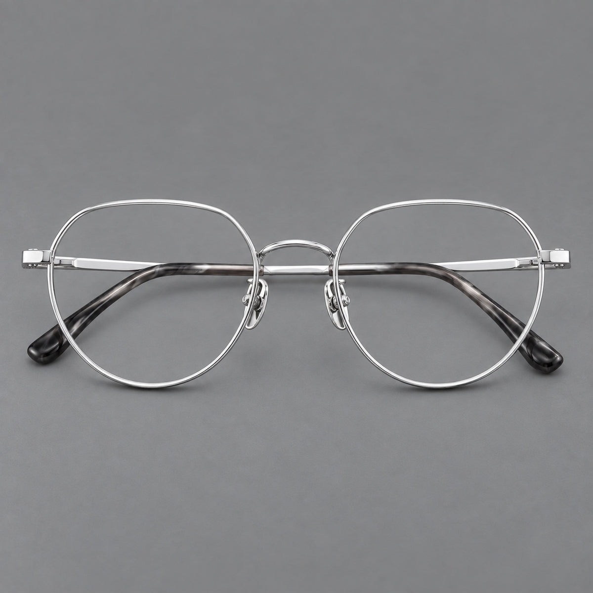 Classic panto titanium glasses with a curved bridge and slim straight temples in Silver, front view