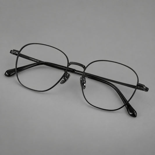 Retro panto titanium glasses with stepped corners and finely engraved temples in Black, three quarter view