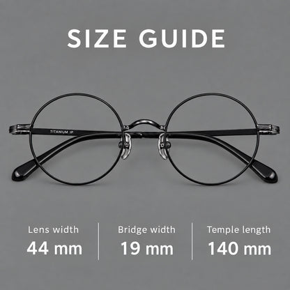 Compact circular titanium glasses with a curved bridge and wavy engraved temples, size guide in millimetres additional product view