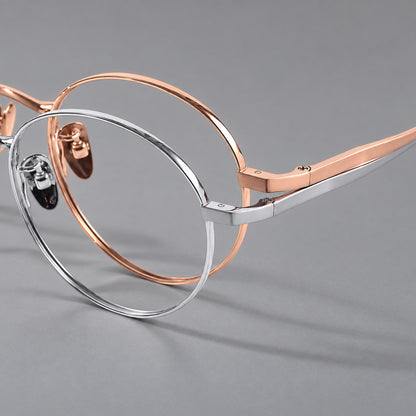 Classic circular titanium glasses with a raised bridge and lined temple accents, frame details additional product view