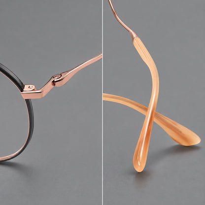 Rounded titanium glasses with a short bridge and distinctive wavy metal temples, frame details additional product view