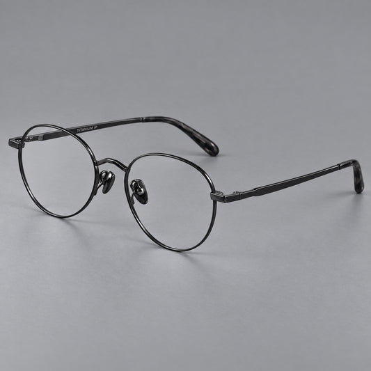 Retro panto titanium glasses with faceted corners and mottled curved temple tips in Black, three quarter view
