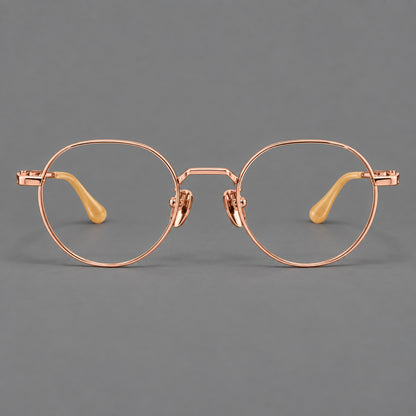 Small panto titanium glasses with an angular bridge and recessed temple details in Rose Gold, front view additional product view