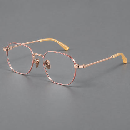 Rounded panto titanium glasses with an angular bridge and broad flat temples in Pink and Rose Gold, three quarter view front view