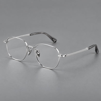 Rounded panto titanium glasses with an angular bridge and broad flat temples in Silver, three quarter view additional product view