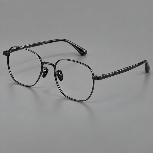 Soft square titanium glasses with a raised bridge and engraved temple bands in Black, three quarter view