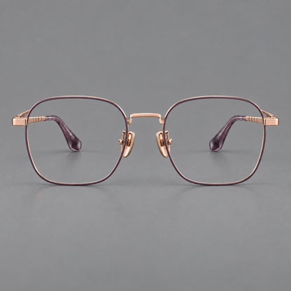 Soft square titanium glasses with a raised bridge and engraved temple bands in Purple and Rose Gold, front view frame detail