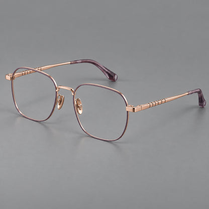 Soft square titanium glasses with a raised bridge and engraved temple bands in Purple and Rose Gold, three quarter view front view