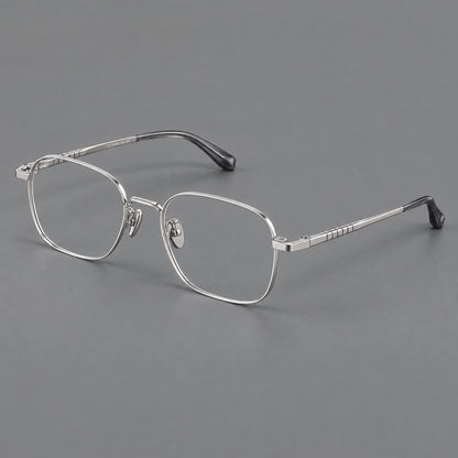 Soft square titanium glasses with a raised bridge and engraved temple bands in Silver, three quarter view additional product view