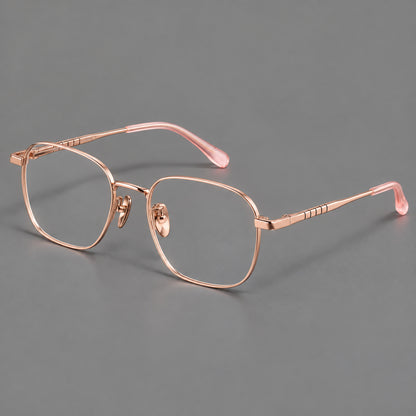 Soft square titanium glasses with a raised bridge and engraved temple bands in Rose Gold, three quarter view additional product view