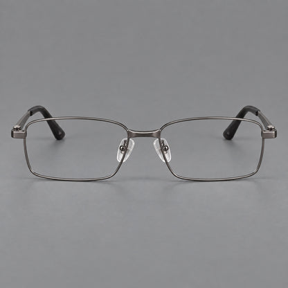 Wide rectangular titanium glasses with a broad bridge and rounded hinge caps in Gunmetal, front view frame detail