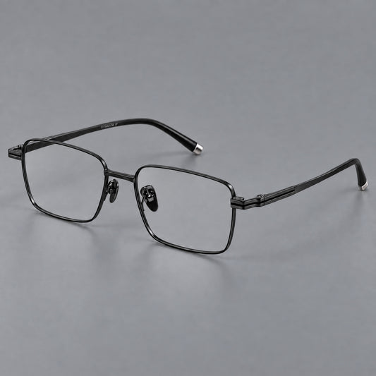 Rectangular titanium glasses with inset corner lines and metal capped temple tips in Black, three quarter view