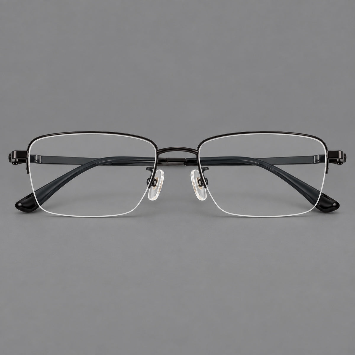 Half frame titanium glasses with rectangular lenses and rounded hinge details in Black, front view