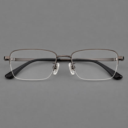 Half frame titanium glasses with rectangular lenses and rounded hinge details in Gunmetal, front view frame detail