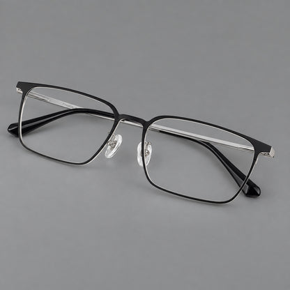 Bold rectangular titanium glasses with strong upper corners and flat metal temples in Black and Silver, three quarter view additional product view