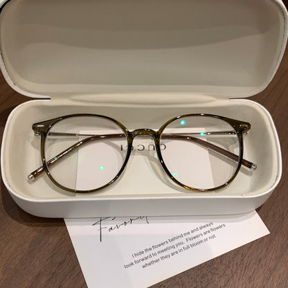 Round Eyeglass Frames with a Defined Browline, Cool Tea Brown or Oolon side view