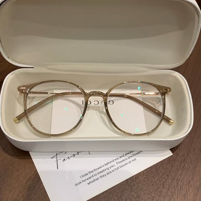 Round Eyeglass Frames with a Defined Browline, Cool Tea Brown or Oolon frame detail