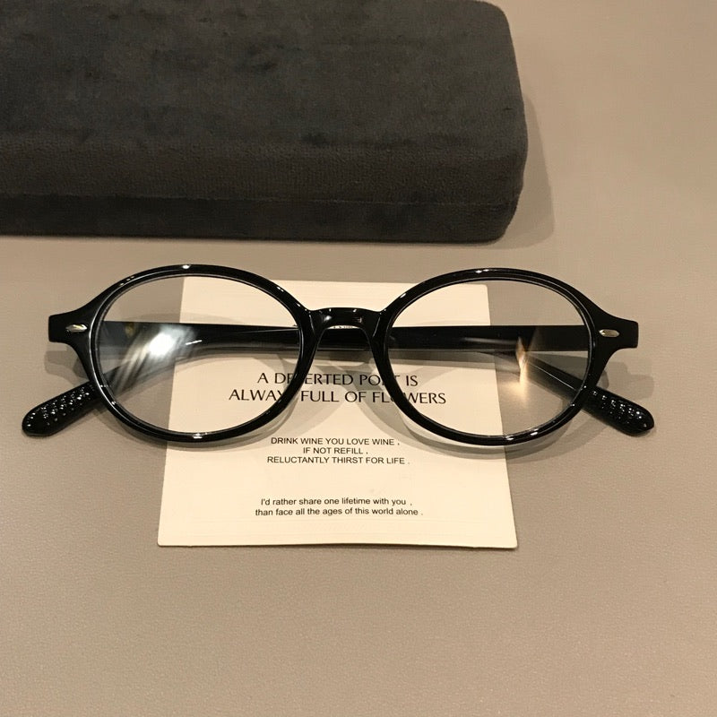 Retro Round Eyeglass Frames with Thick Rims and a Raised Bridge, Black