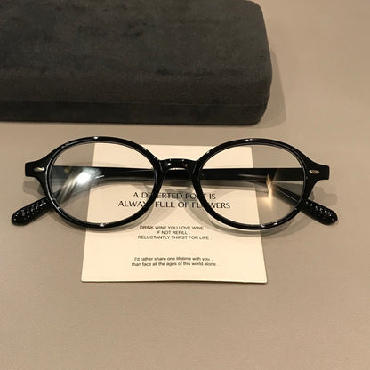 Retro Round Eyeglass Frames with Thick Rims and a Raised Bridge, Black