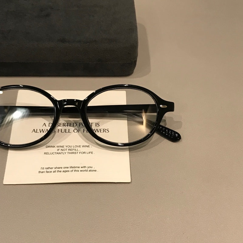 Retro Round Eyeglass Frames with Thick Rims and a Raised Bridge, Black