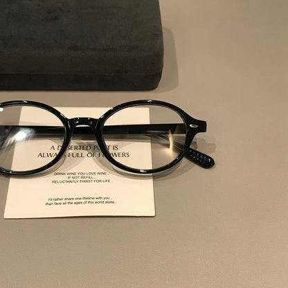 Retro Round Eyeglass Frames with Thick Rims and a Raised Bridge, Black side view