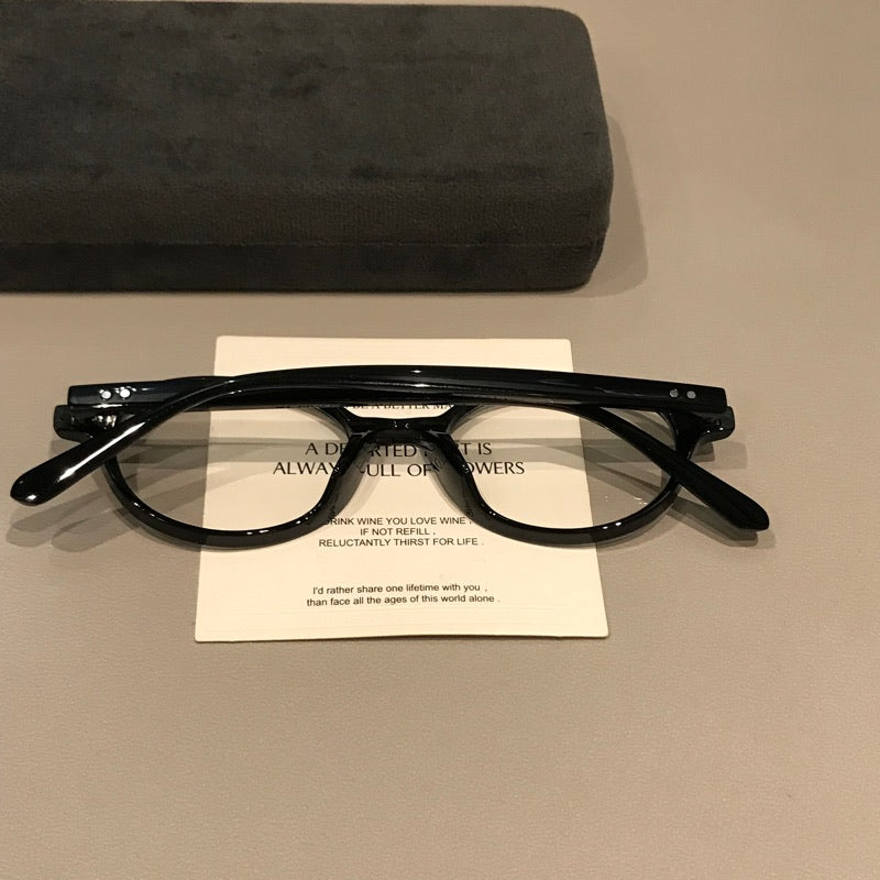 Retro Round Eyeglass Frames with Thick Rims and a Raised Bridge, Black