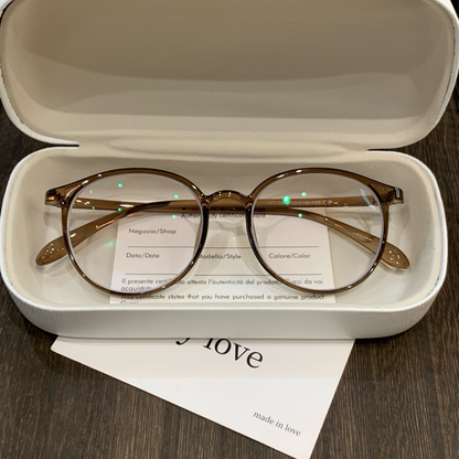 Round Eyeglass Frames with Thin Rims and a Curved Brow, Cool Tea Brown