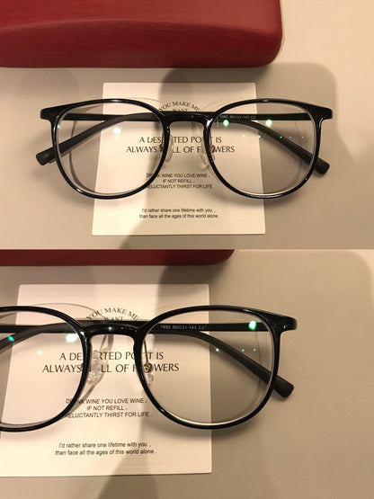Square Eyeglass Frames with Thin Rims and a Curved Bridge, Black front view