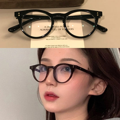 Compact Oval Eyeglass Frames with Thick Rims, Black or Tortoiseshell front view