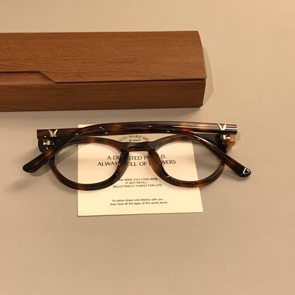 Compact Oval Eyeglass Frames with Thick Rims, Black or Tortoiseshell additional product view