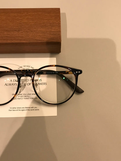 Retro Rounded Eyeglass Frames with a Raised Bridge, Tortoiseshell and frame detail