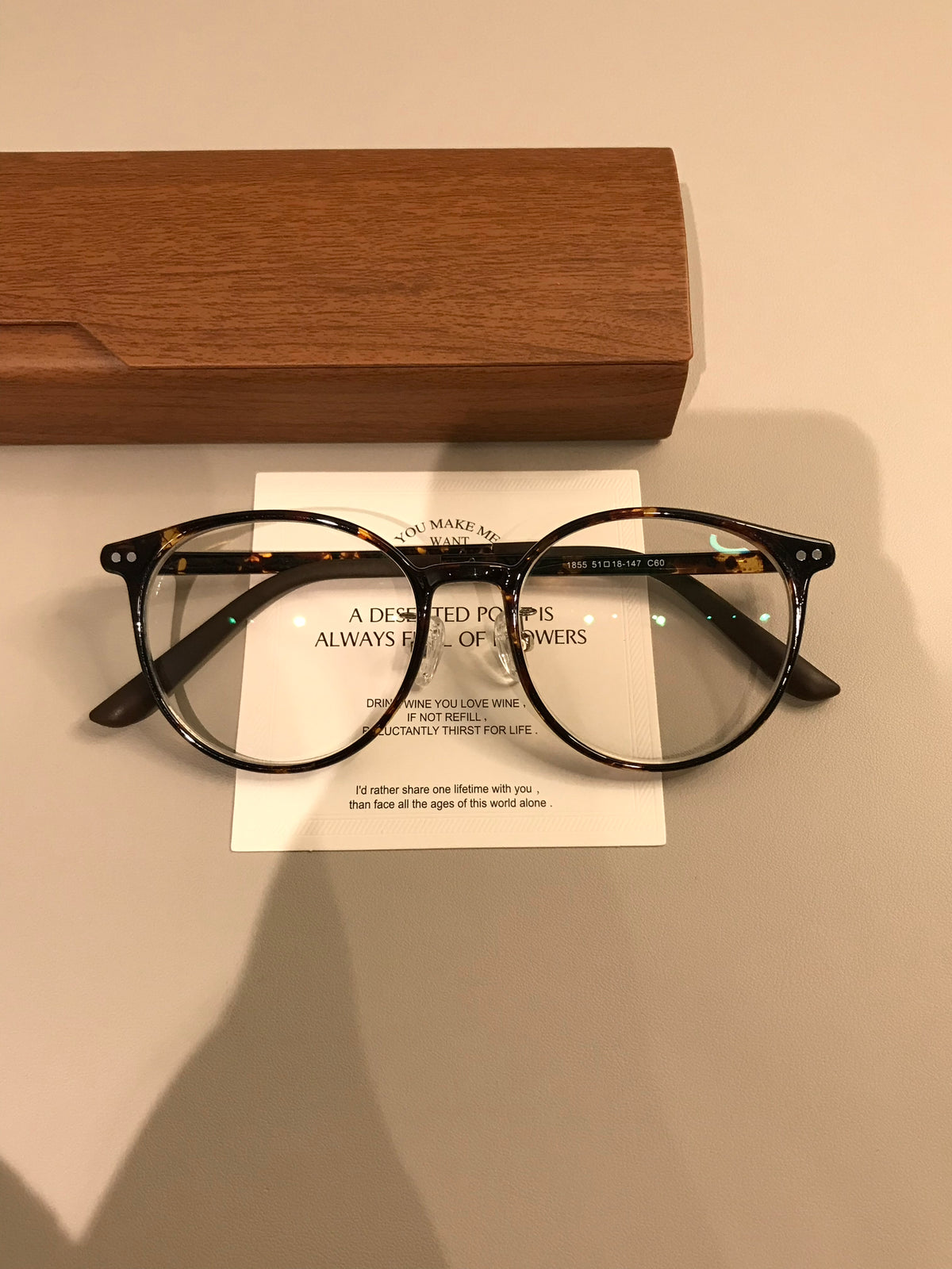 Retro Rounded Eyeglass Frames with a Raised Bridge, Tortoiseshell and lens detail