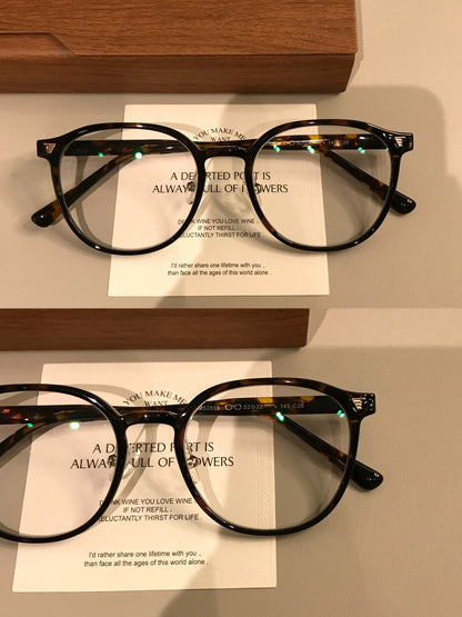 Rounded Square Eyeglass Frames with a Raised Brow, Amber Tortoiseshell side view