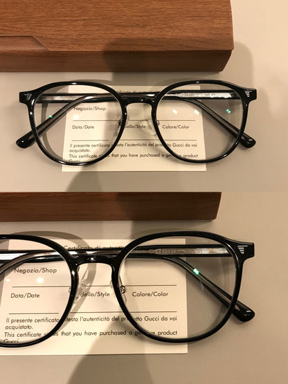 Rounded Square Eyeglass Frames with a Raised Brow, Amber Tortoiseshell front view