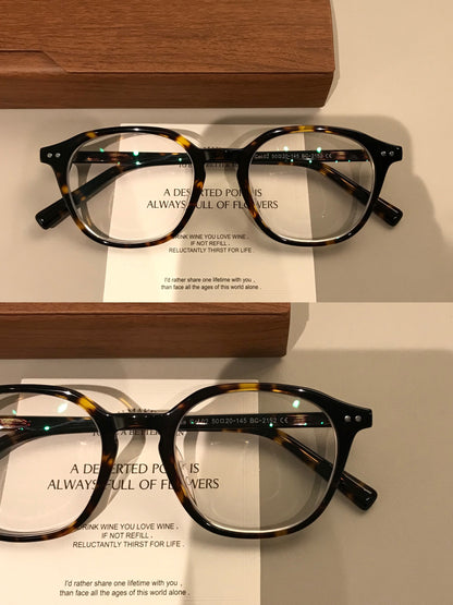 Retro Eyeglass Frames with a Rounded Front and Broad Temples, Four Col front view