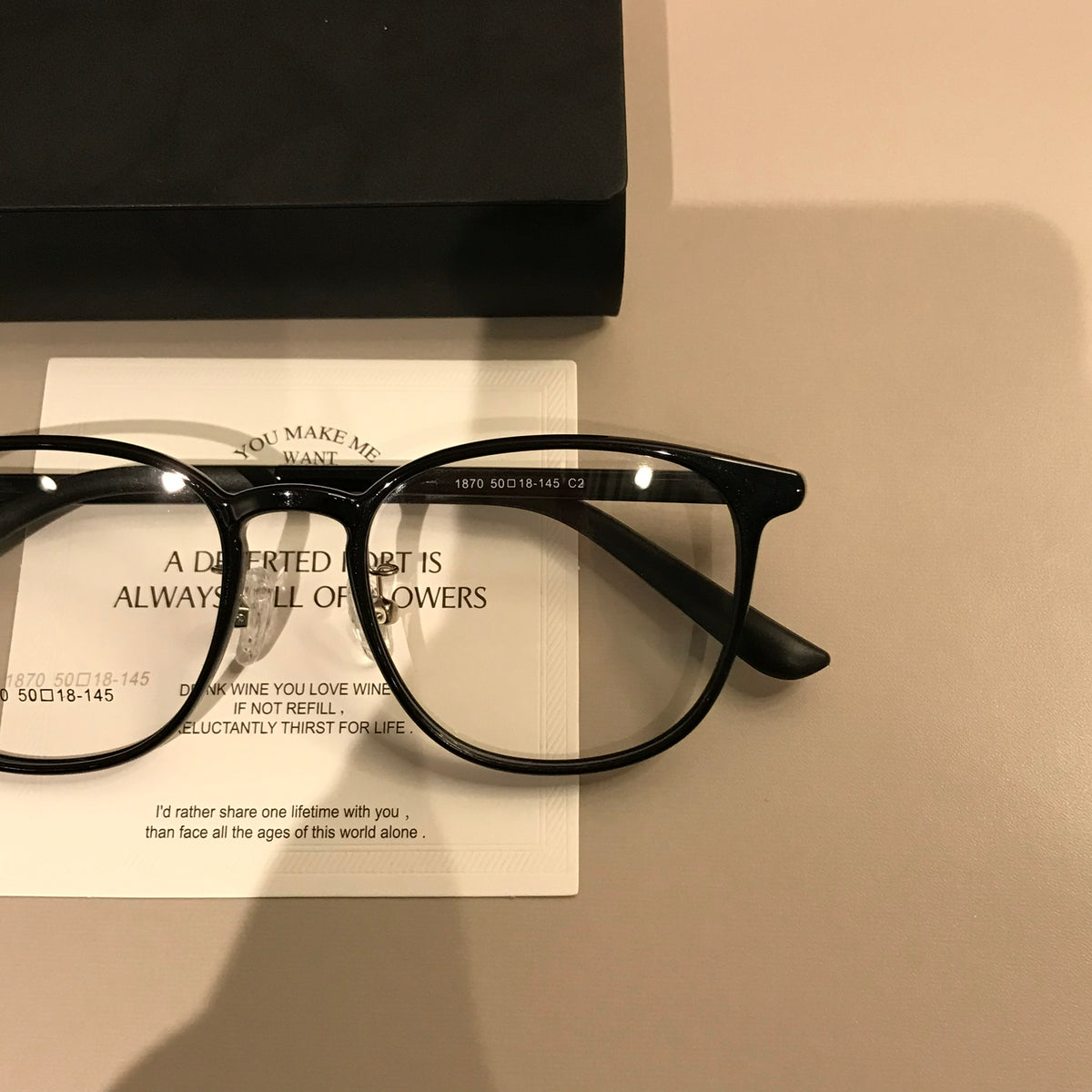 Compact Round Eyeglass Frames with Corner Accents, Black, Latte Brown lens detail