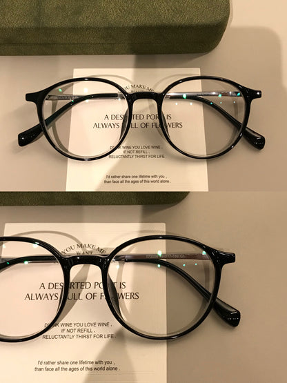 Round Eyeglass Frames with a Keyhole-Style Bridge, Black or Transparen side view