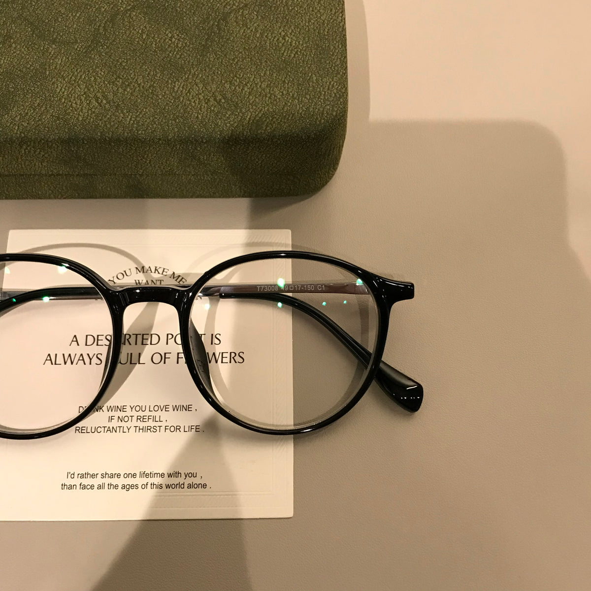 Round Eyeglass Frames with a Keyhole-Style Bridge, Black or Transparen temple detail