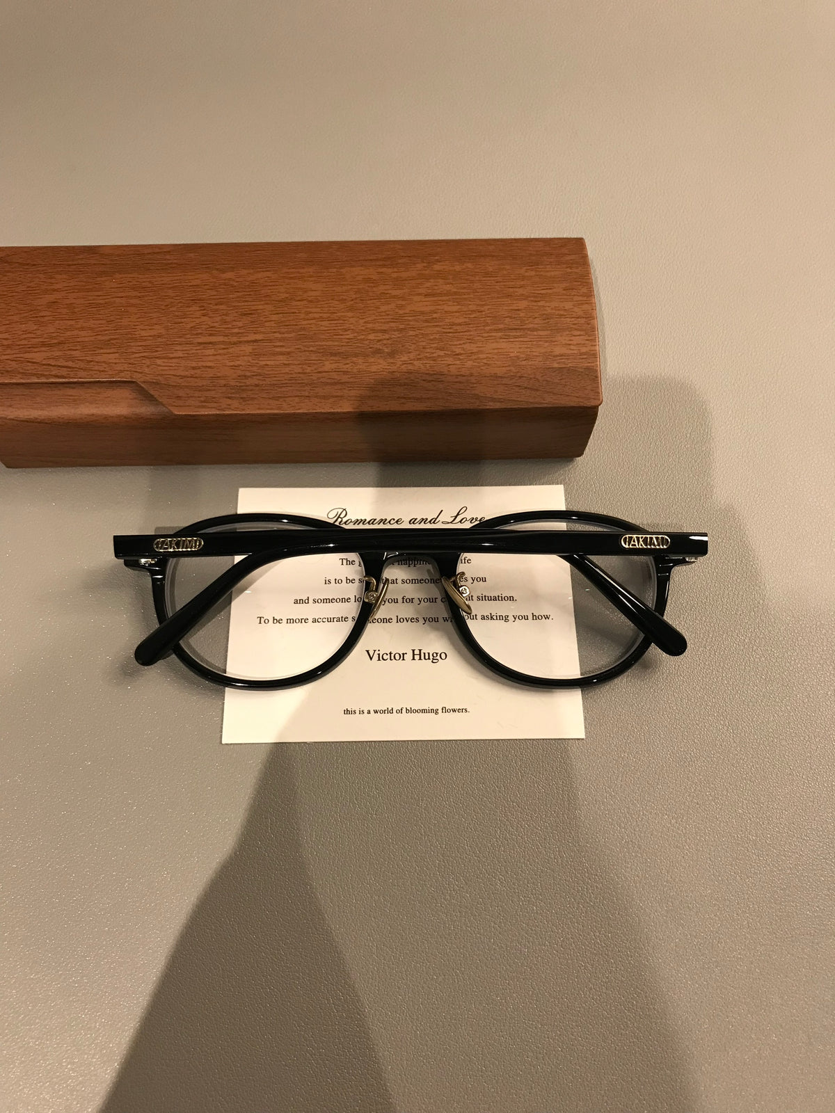 Oval Eyeglass Frames with a Thick Upper Rim, Black, Burgundy or Tortoi temple detail